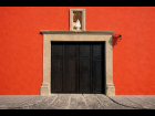 Weathered door and Virgin Mary niche