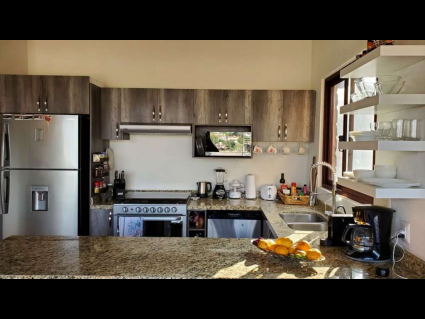 golden-frida-apartment-kitchen-1024x576